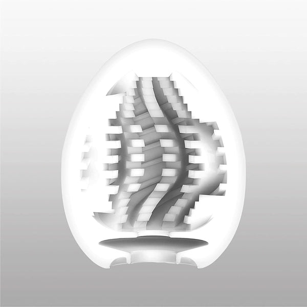 TENGA EGG TORNADO 內部剖面結構圖,顯示螺旋紋理與鋸齒邊緣設計,提供強烈旋轉與多層次刺激體驗。