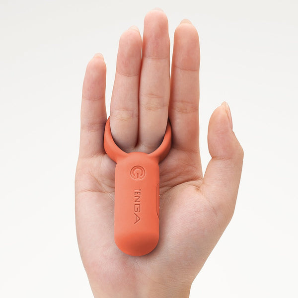 TENGA paiRING CORAL 珊瑚橙色震動器套於手指使用