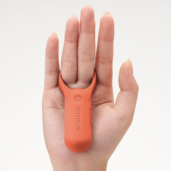 TENGA paiRING+ CORAL 珊瑚橙色震動器套於手指使用