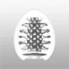 TENGA EGG BRUSH 的蛋型剖面示意圖，內部長突起刷毛結構帶來細膩且連續的刺激體驗。