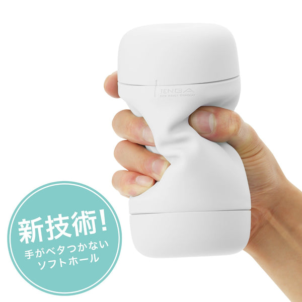 Tenga Puffy Sugar White，手握展示，柔韌材質提供舒適觸感